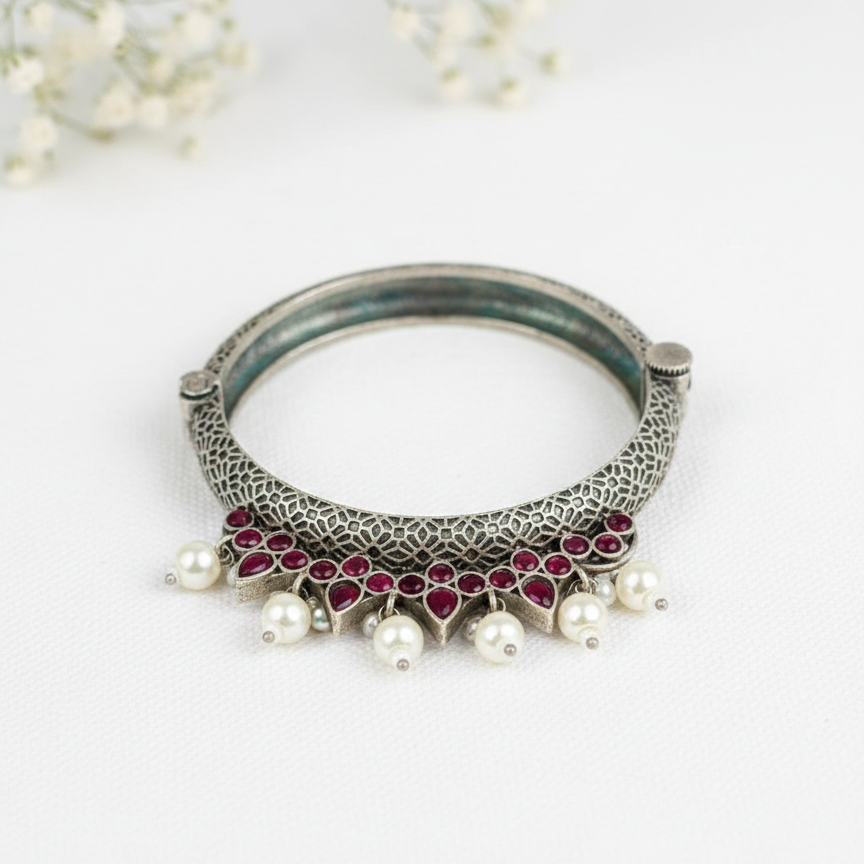 Oxidized Silver Tribal Bangle with Ruby-Red Stones & Pearl Droplets – Handcrafted Ethnic Kada
