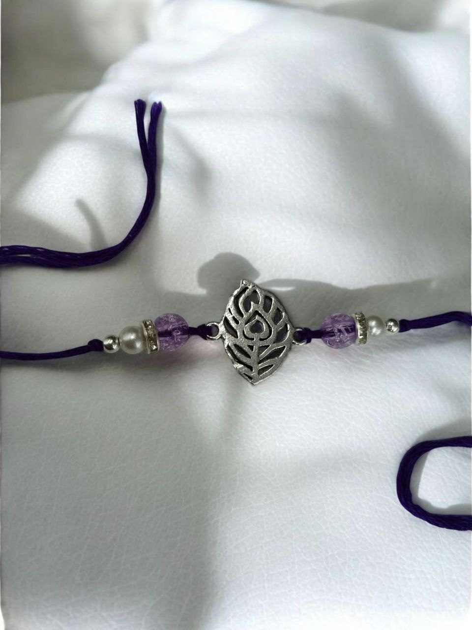 Latest Silver Krishna Mor Pankh Rakhi